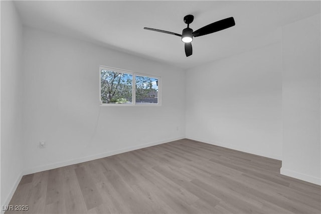 1317 Pyramid Dr, Las Vegas, NV 89108 - spare room featuring wood finished floors and ceiling fan