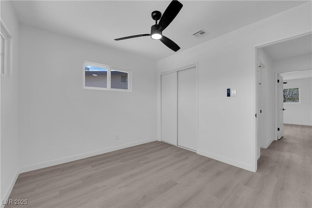 1317 Pyramid Dr, Las Vegas, NV 89108 - unfurnished bedroom featuring light wood finished floors, a closet, and ceiling fan
