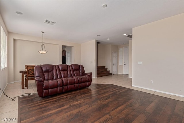9221 Thunder Falls Ct, Las Vegas, NV 89149 - living room with recessed lighting, stairway, and light wood-style floors