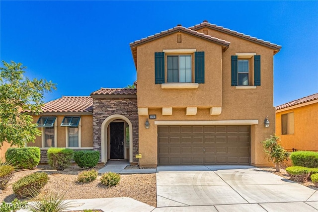 9221 Thunder Falls Ct, Las Vegas, NV 89149 - mediterranean / spanish home featuring a tiled roof, stone siding, concrete driveway, stucco siding, and a garage