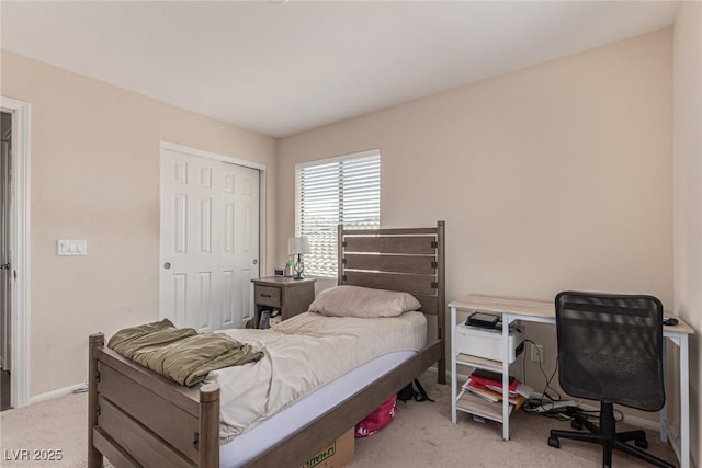 9221 Thunder Falls Ct, Las Vegas, NV 89149 - bedroom featuring light colored carpet, a closet, and an office area
