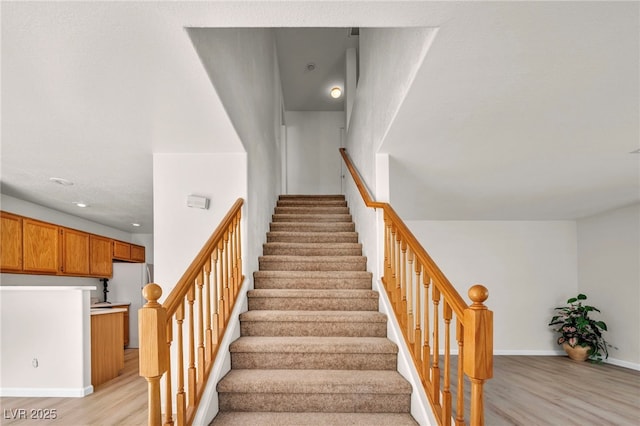 3448 Twilight Star Dr, Las Vegas, NV 89117 - staircase with wood finished floors and recessed lighting