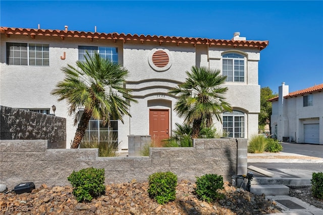 3448 Twilight Star Dr, Las Vegas, NV 89117 - mediterranean / spanish-style home with stucco siding and a chimney
