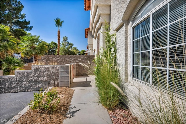 3448 Twilight Star Dr, Las Vegas, NV 89117 - view of side of home featuring stucco siding