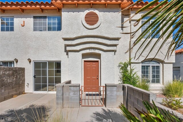 3448 Twilight Star Dr, Las Vegas, NV 89117 - doorway to property with stucco siding and a tile roof