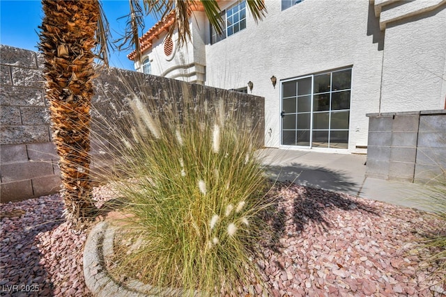 3448 Twilight Star Dr, Las Vegas, NV 89117 - view of property exterior with stucco siding and a patio
