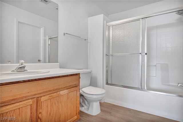 3448 Twilight Star Dr, Las Vegas, NV 89117 - full bathroom with vanity, wood finished floors, and shower / bath combination with glass door