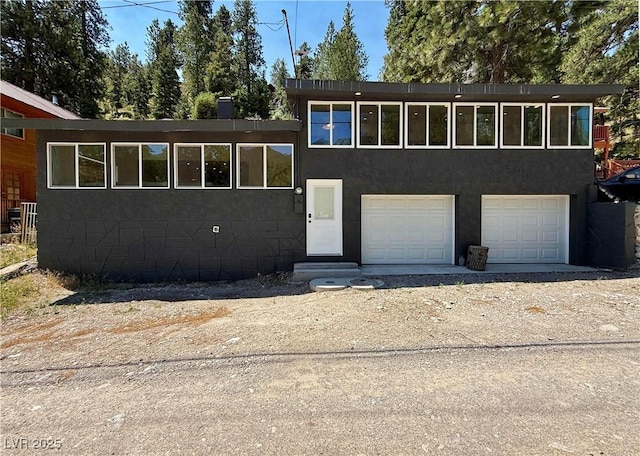 4651 Aspen Ave, Mount Charleston, NV 89124 - view of front of home with driveway and an attached garage