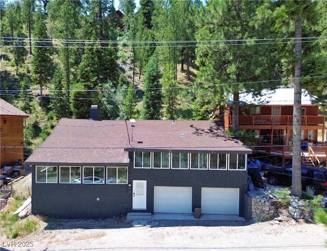 4651 Aspen Ave, Mount Charleston, NV 89124 - view of front of property with roof with shingles and an attached garage
