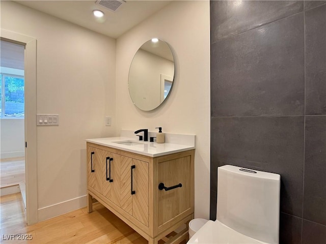 4651 Aspen Ave, Mount Charleston, NV 89124 - bathroom featuring wood finished floors, vanity, and recessed lighting