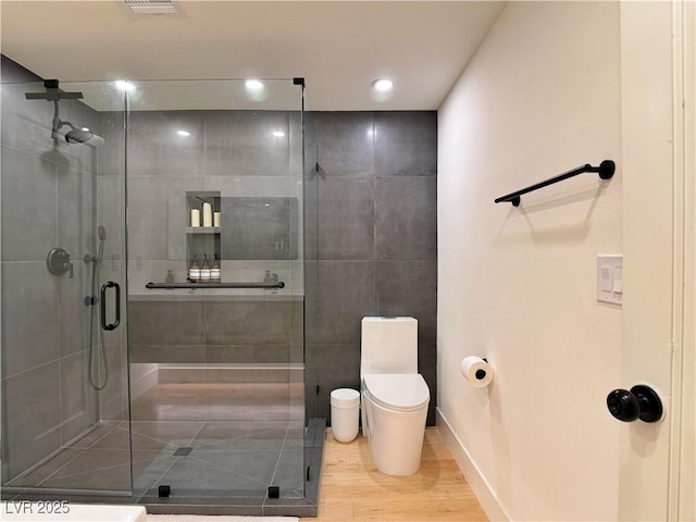 4651 Aspen Ave, Mount Charleston, NV 89124 - full bathroom with wood finished floors, a stall shower, and recessed lighting