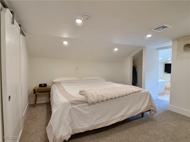 4651 Aspen Ave, Mount Charleston, NV 89124 - bedroom with light carpet, a spacious closet, recessed lighting, and lofted ceiling