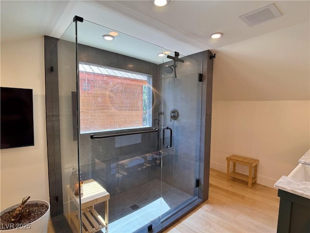 4651 Aspen Ave, Mount Charleston, NV 89124 - bathroom featuring wood finished floors, a stall shower, vanity, and recessed lighting