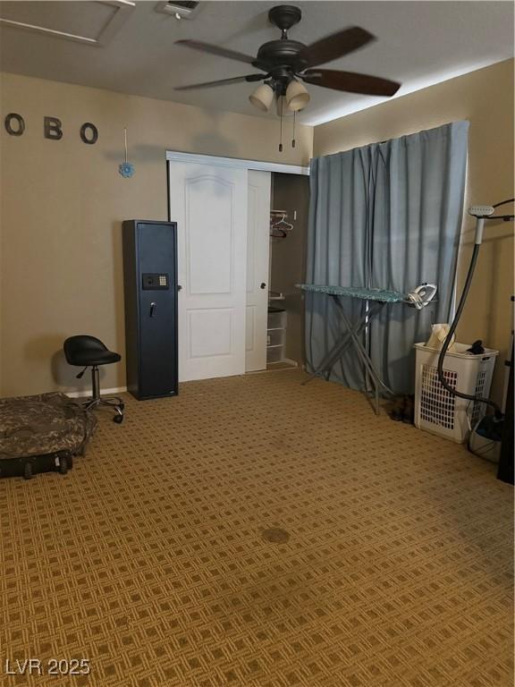 5315 Debut Ct, North Las Vegas, NV 89031 - miscellaneous room with ceiling fan and carpet