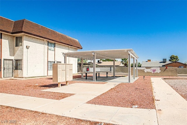 4348 Tara Ave Unit 2, Las Vegas, NV 89102 - view of home's community featuring mail area and a pergola