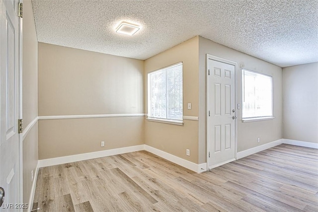 4348 Tara Ave Unit 2, Las Vegas, NV 89102 - foyer featuring wood finished floors and a textured ceiling