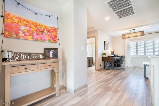10183 Cascadia Creek St, Las Vegas, NV 89141 - corridor with a desk, light wood finished floors, and recessed lighting