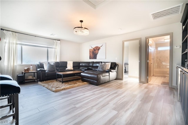 10183 Cascadia Creek St, Las Vegas, NV 89141 - living area featuring plenty of natural light and light wood-style floors