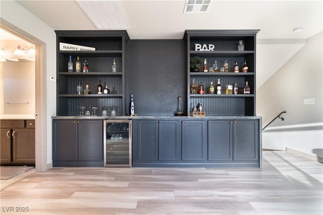 10183 Cascadia Creek St, Las Vegas, NV 89141 - indoor wet bar featuring wine cooler and light wood-style flooring