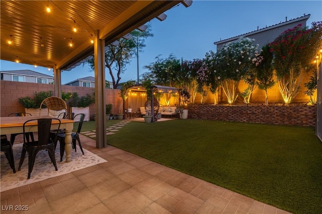 10183 Cascadia Creek St, Las Vegas, NV 89141 - fenced backyard featuring a patio and outdoor dining space