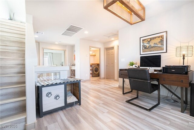 10183 Cascadia Creek St, Las Vegas, NV 89141 - office space featuring washer / clothes dryer, light wood-style flooring, and recessed lighting