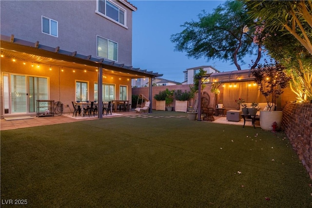 10183 Cascadia Creek St, Las Vegas, NV 89141 - rear view of property with stucco siding, a patio, and a fenced backyard