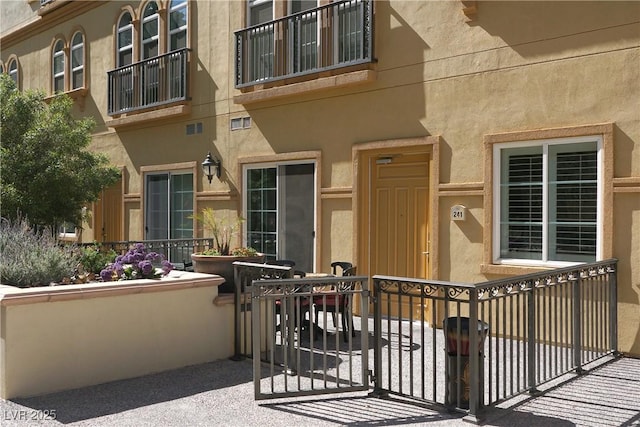 2405 Serene Ave Unit 241, Las Vegas, NV 89123 - doorway to property with stucco siding