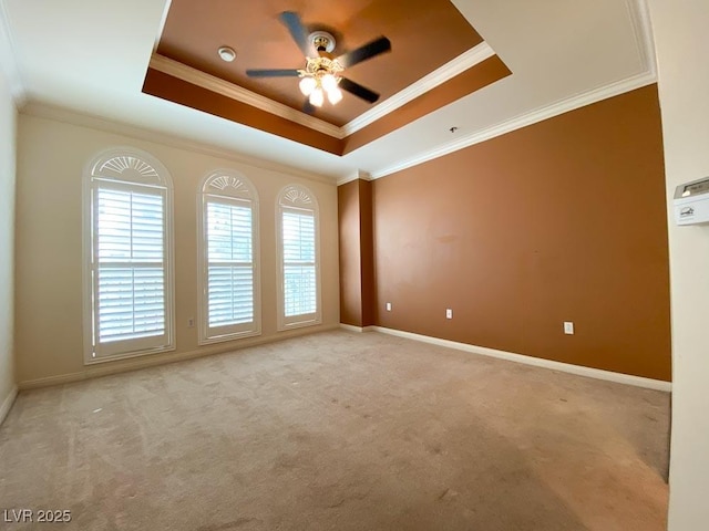 2405 Serene Ave Unit 241, Las Vegas, NV 89123 - unfurnished room with a raised ceiling, a ceiling fan, carpet flooring, and crown molding
