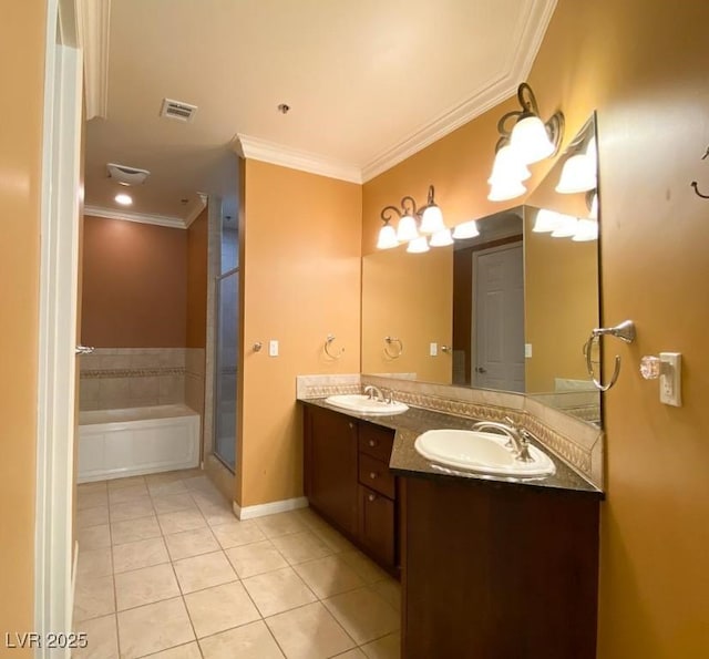 2405 Serene Ave Unit 241, Las Vegas, NV 89123 - bathroom featuring tile patterned floors, crown molding, a garden tub, double vanity, and an enclosed shower