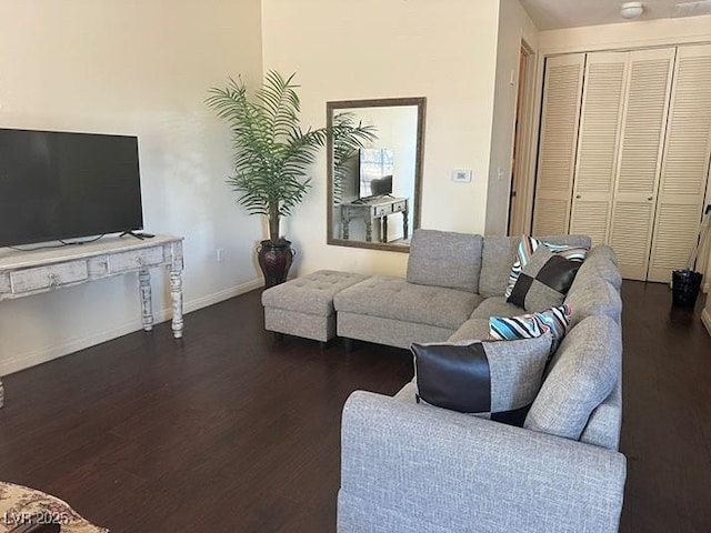 2405 Serene Ave Unit 241, Las Vegas, NV 89123 - living area with dark wood-style floors and baseboards