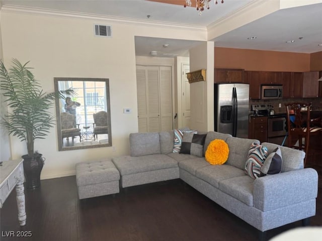 2405 Serene Ave Unit 241, Las Vegas, NV 89123 - living area with dark wood finished floors, crown molding, and recessed lighting