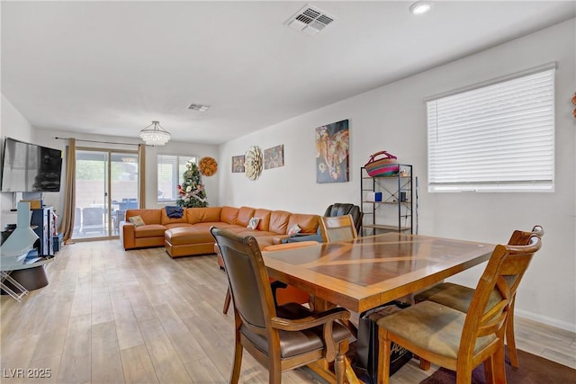 6324 Conlon St, North Las Vegas, NV 89081 - dining space featuring light wood finished floors, a chandelier, and recessed lighting