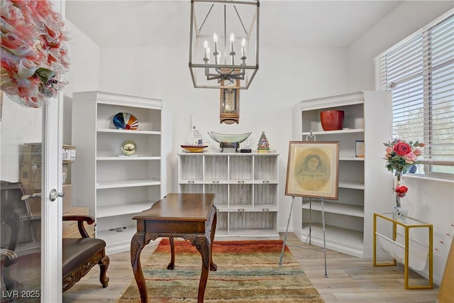 6324 Conlon St, North Las Vegas, NV 89081 - office with wood finished floors and a chandelier