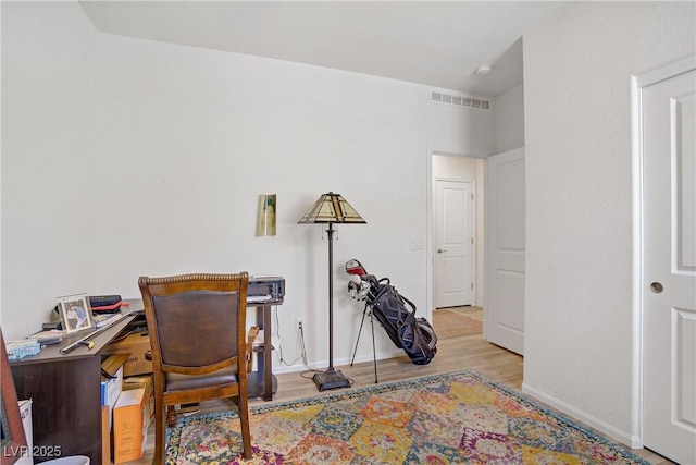 6324 Conlon St, North Las Vegas, NV 89081 - home office with wood finished floors and baseboards