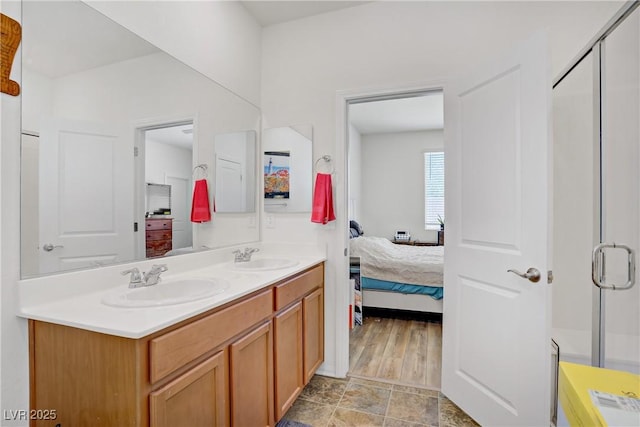 6324 Conlon St, North Las Vegas, NV 89081 - full bathroom with connected bathroom, double vanity, and a shower with shower door