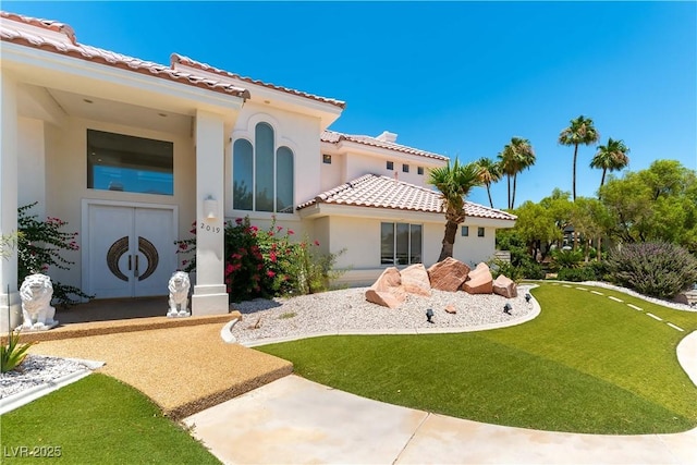 2019 Doral Ct, Henderson, NV 89074 - property entrance with a tiled roof and stucco siding