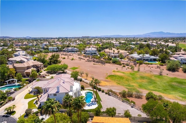 2019 Doral Ct, Henderson, NV 89074 - aerial perspective of suburban area featuring a pool area and a mountainous background
