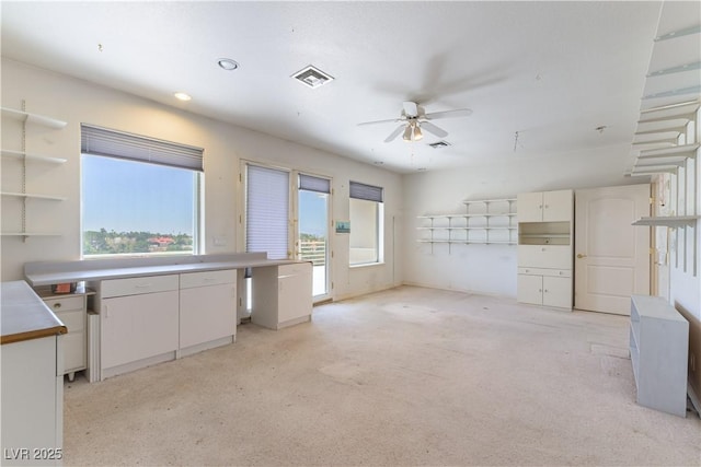 2019 Doral Ct, Henderson, NV 89074 - unfurnished living room with a ceiling fan, light colored carpet, and recessed lighting