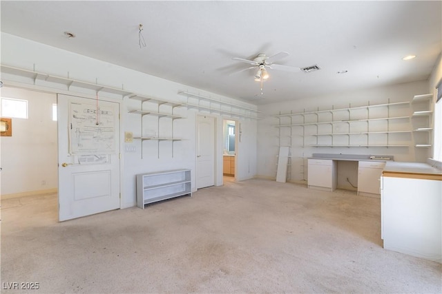 2019 Doral Ct, Henderson, NV 89074 - below grade area featuring a ceiling fan, light carpet, and plenty of natural light