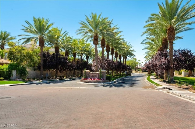 2019 Doral Ct, Henderson, NV 89074 - view of decorative road with curbs, sidewalks, and a gate