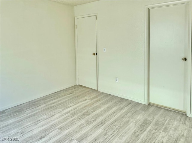 805 Rock Springs Dr Unit 101, Las Vegas, NV 89128 - spare room featuring light wood-type flooring