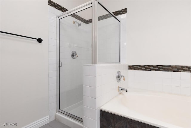 1609 Hills Of Red Dr Unit 104, Las Vegas, NV 89128 - full bath with a garden tub and a stall shower
