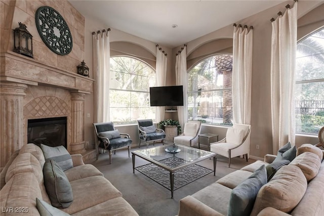 1609 Hills Of Red Dr Unit 104, Las Vegas, NV 89128 - living area featuring a fireplace and carpet flooring