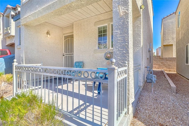 9068 Alluring Ave, Las Vegas, NV 89149 - property entrance featuring stucco siding