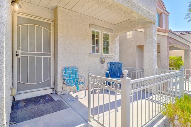 9068 Alluring Ave, Las Vegas, NV 89149 - doorway to property with stucco siding