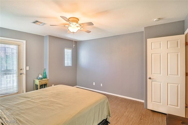 9068 Alluring Ave, Las Vegas, NV 89149 - bedroom featuring light wood finished floors and a ceiling fan