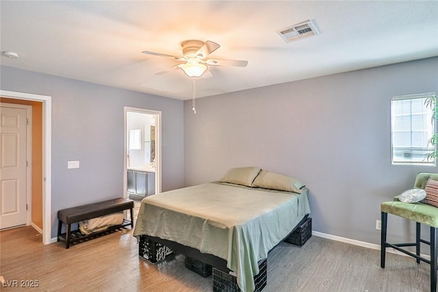 9068 Alluring Ave, Las Vegas, NV 89149 - bedroom featuring light wood-type flooring, ceiling fan, and connected bathroom
