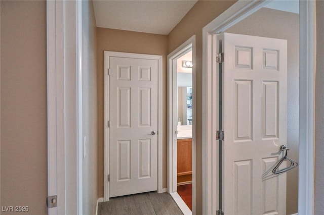 9068 Alluring Ave, Las Vegas, NV 89149 - corridor featuring wood finished floors and baseboards