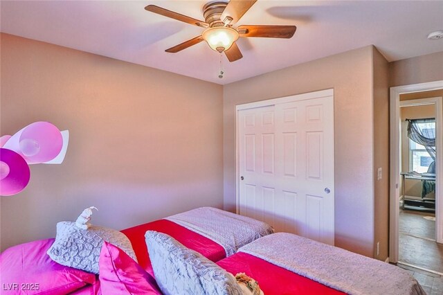 9068 Alluring Ave, Las Vegas, NV 89149 - bedroom with a closet and ceiling fan