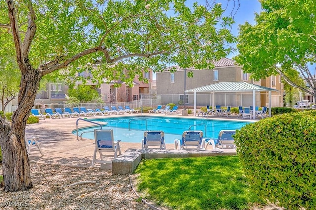 9068 Alluring Ave, Las Vegas, NV 89149 - community pool featuring a patio